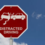 Sign that reads distracted driving.jpg.crdownload Sign that reads distracted driving.jpg.crdownload
