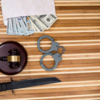 knife with a gavel and money knife with a gavel and money