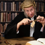 Judge holding knife in court Judge holding knife in court