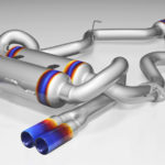 Tuning exhaust system for a sports car. Car muffler, exhaust silencer. Tuning exhaust system for a sports car. Car muffler, exhaust silencer.