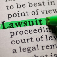word lawsuit highlighted in green word lawsuit highlighted in green