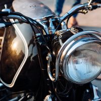 Close-up view on retro motorcycle headlights. Close-up view on retro motorcycle headlights.