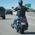 Lone motorbike rider on the expressway