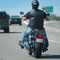 Lone motorbike rider on the expressway Lone motorbike rider on the expressway