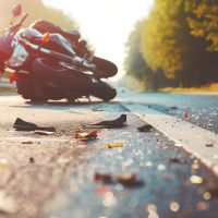 Crash on the road. Close up of a motorcycle accident on the road