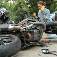 collision-between-motorcycle-and-car-on-the-road